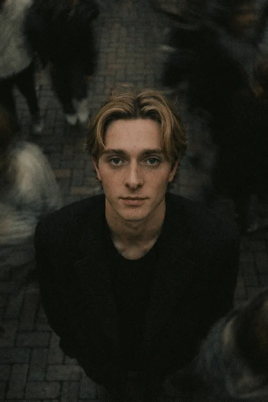 Cinematic overhead street shot with motion-blurred crowd