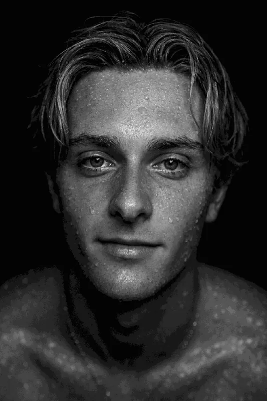 Black and white close-up portrait with water droplets
